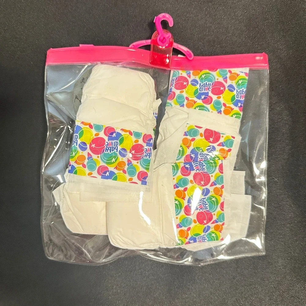 Baby Alive Doll Diaper‎ Refill, Includes 4 Diapers and Barbie plastic carry bag